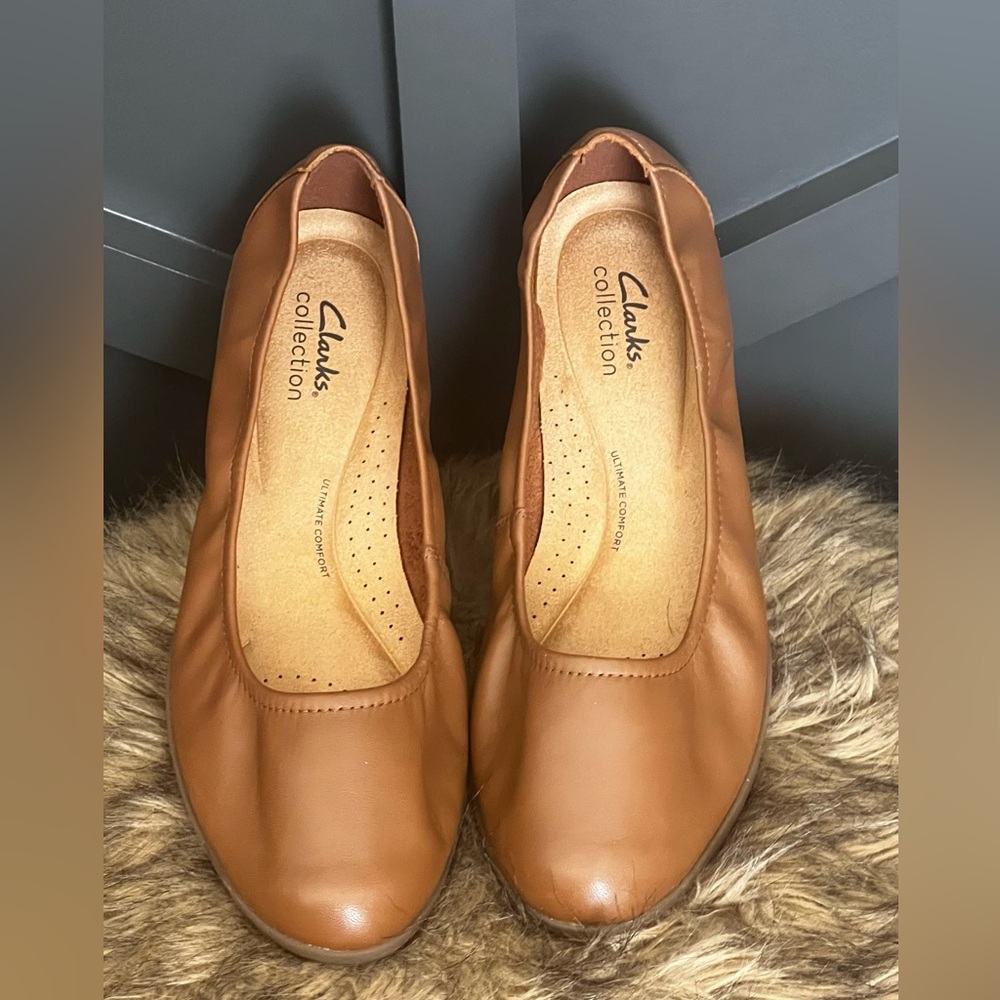 Clark’s cognac brown leather flats